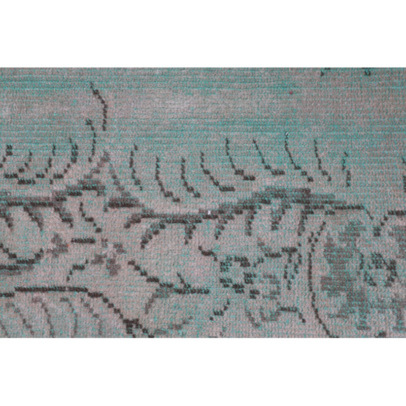 Élégant tapis de porte turc rétro avec des tons de vert doux et un motif floral tissé à la main