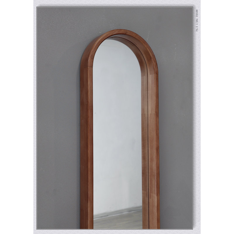 Élégant miroir ovale allongé avec cadre en caoutchouc durable, parfait pour améliorer l'esthétique de la pièce et la lumière naturelle.