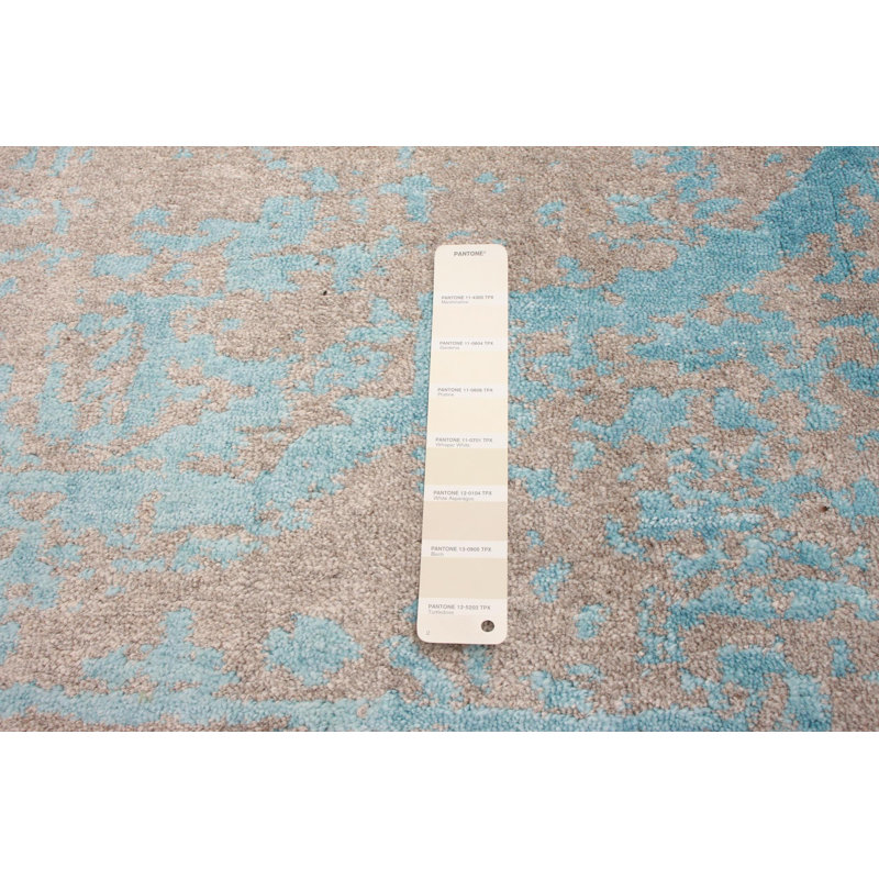 Tapis beige noué à la main