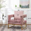 Fauteuil rembourré en velours rose avec structure en métal doré et accoudoirs découpés-748704169