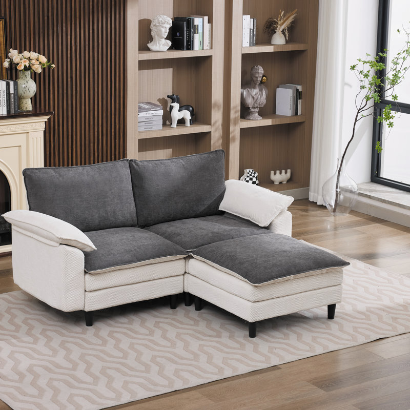 Canapé modulaire réversible en tissu chenille avec repose-pieds flottant et accoudoirs coussinés