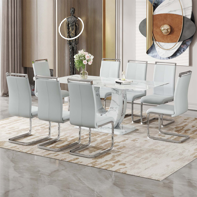 Ensemble de table et de chaises Willistine, ensemble de salle à manger moderne simple en marbre avec chaises en polyuréthane, autocollant en marbre, plateau de table en verre trempé, avec pieds de chaise arqués en métal