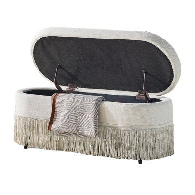 Oval Upholstered Storage Ottoman with Fringe Trim & Lift-Top Lid - 39"L x 16"W x 17"H, Multi-Functional Footrest & Hidden Storage for Living Room or Bedroom - Beige Fabric with Metal Frame
