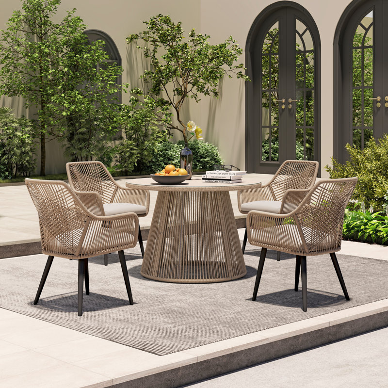 Outdoor Round 4 - Person 43.3" Long Dining Set With Cushions