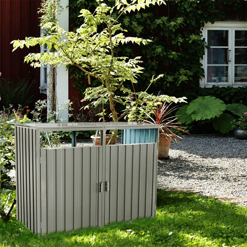 La remise à poubelle permet de ranger 2 poubelles en métal pour le rangement des ordures