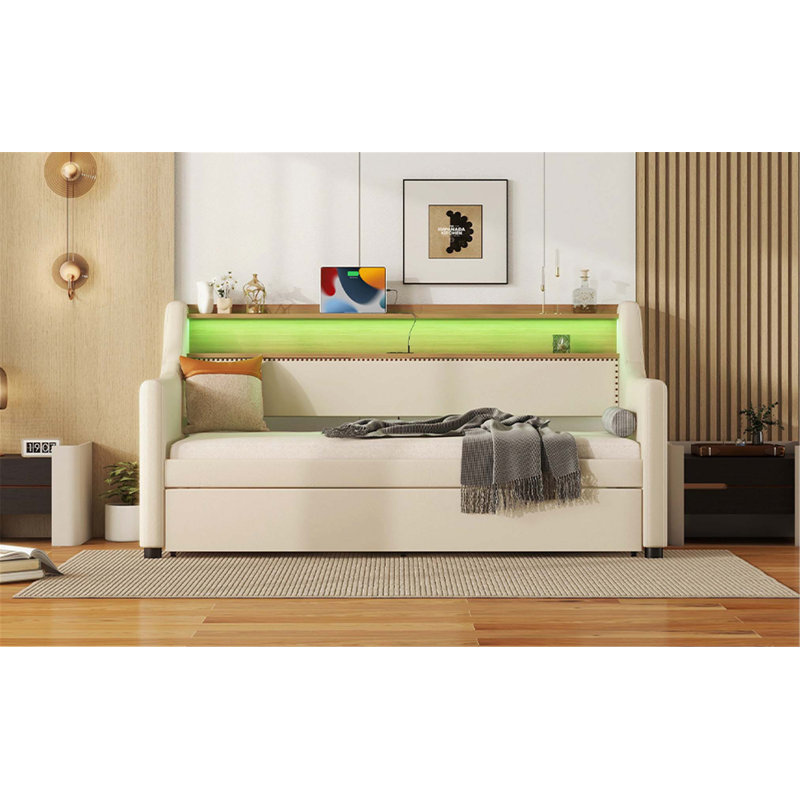 Twin Upholstered Daybed with Trundle, Cloud-Backrest Design, Built-in Charging Station and LED Lighting for Modern Living.