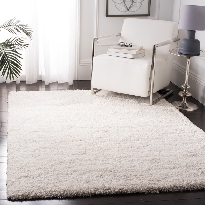Solid Colour Machine Woven Polypropylene Area Rug in Cream, Rectangle 6'7" x 9'