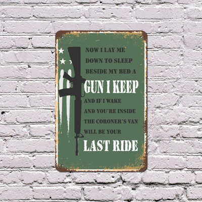 Beside My Bed a Gun I Keep 8 Inch x 12 Inch Plastic Sign