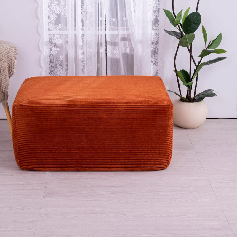 Repose-pieds polyvalent en velours côtelé orange, confort et style pour la maison