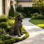 Statue réaliste de cocker spaniel assis pour la décoration extérieure de la maison