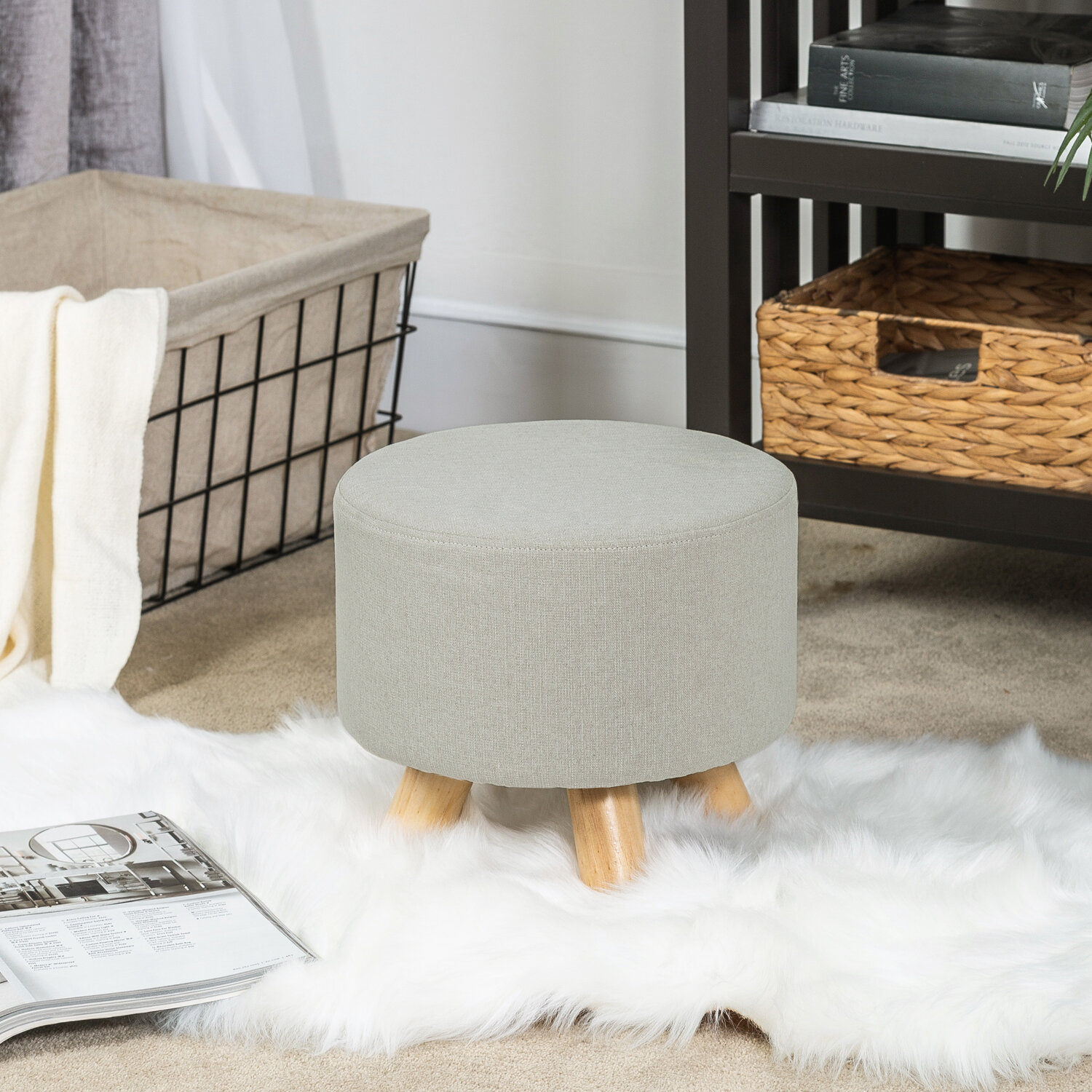 https://assets.wfcdn.com/im/62246914/compr-r85/1793/179387948/round-ottoman-foot-rest-stool-small-fabric-footstool-with-non-skid-wood-legs-beige.jpg