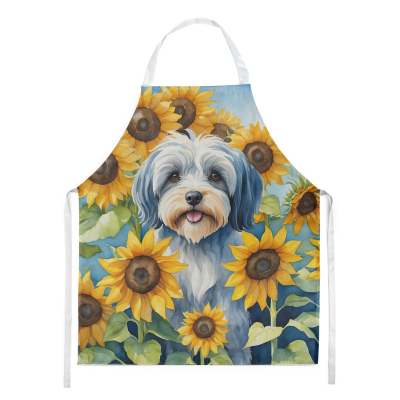 Terrier tibétain avec tablier tournesols
