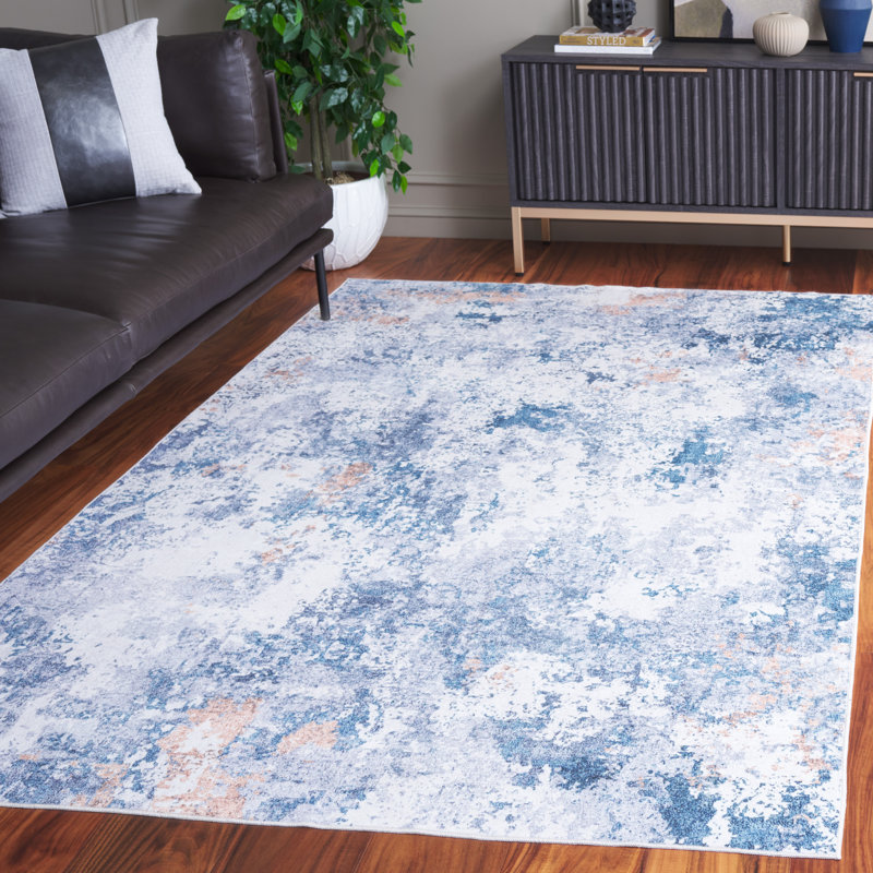 Tapis bleu / ivoire en polyester tissé à la machine Sumentra, Rectangle de 5 pi x 8 pi