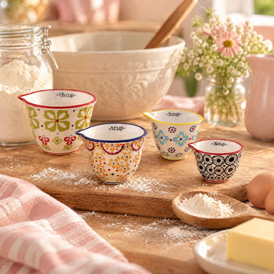 4‑Piece Hand‑Stamped Stoneware Measuring Cups with Floral Patterns