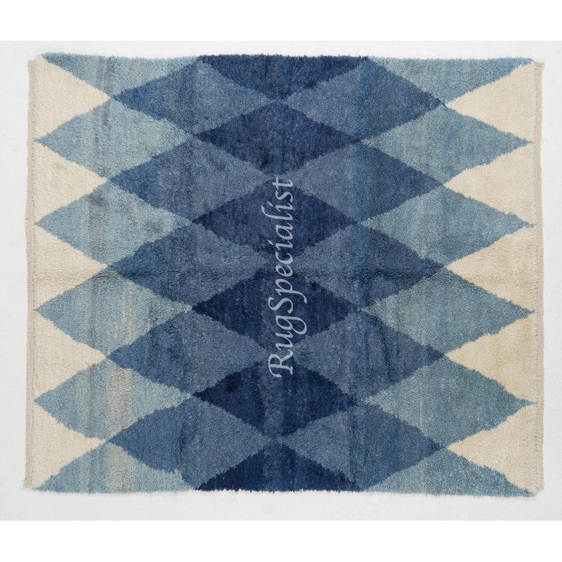 Tapis contemporain en laine avec losanges bleus imbriqués