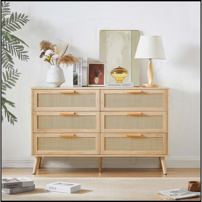 Charmante commode en rotin pour enfants et espaces de vie, améliorant l'organisation et le style.