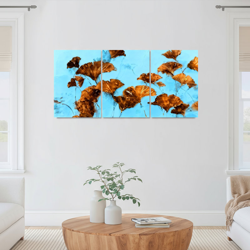 Ensemble de 3 tableaux sur toile tendue représentant des feuilles d'automne sur un ciel bleu, H 24 po x l 48 po