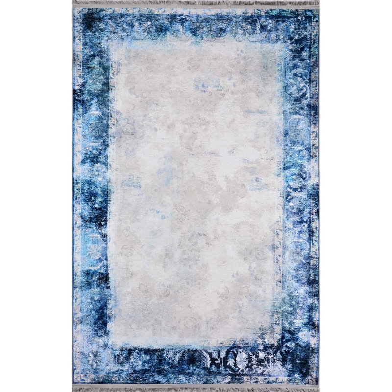 Tapis bleu lavable à motif frangé classique