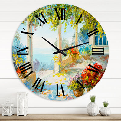 Terrace Near The Sea With Red Flowers - Nautical & Coastal wall clock