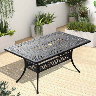 Table de salle à manger en aluminium coulé durable avec cadre et trou pour parasol, parfaite pour les rassemblements en plein air et la détente.