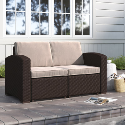 Alderman Faux Rattan Loveseat with All-Weather Cushions