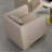 A beige sofa and coffee table reception set