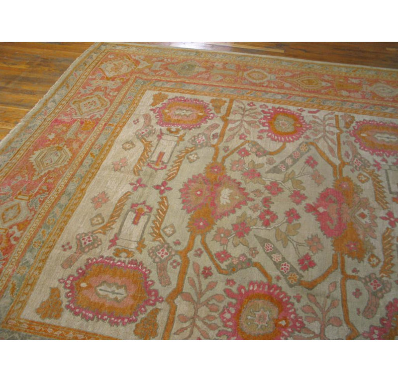 Beautifully Decorative Light Ivory Background Antique Turkish Oushak Rug
