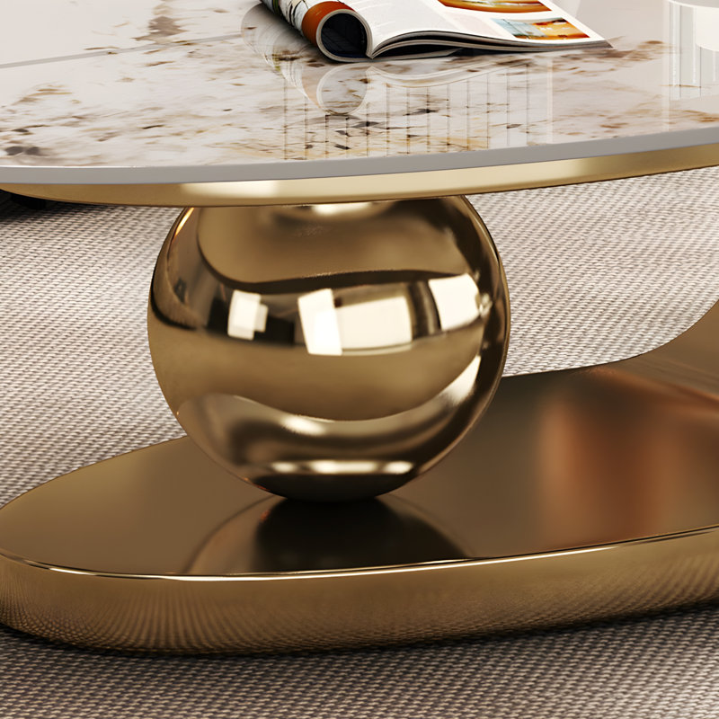 Table basse ovale luxueuse 51 "avec base dorée et plateau en pierre frittée