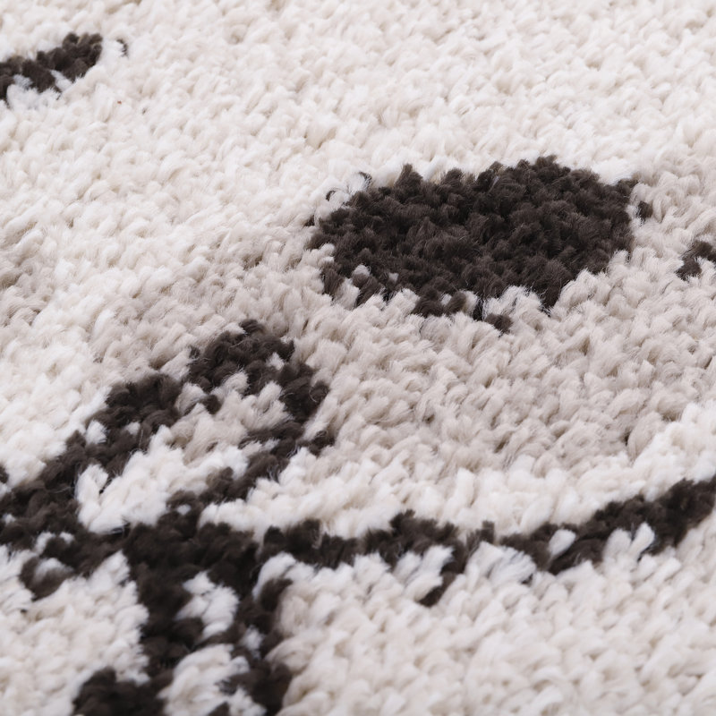 Sutton Tufted White/Black Rug