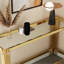 Console avec verre trempé double couche, cadre en acier inoxydable au fini miroir doré, style moderne et élégant