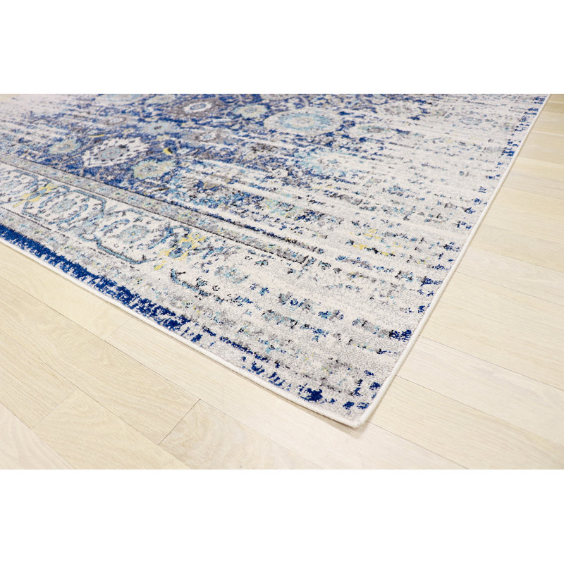 Navy and Ivory 5' x 7'6" Synthetic Stain-Resistant Area Rug