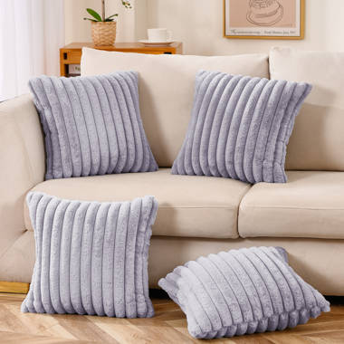 https://assets.wfcdn.com/im/62299856/resize-h380-w380%5Ecompr-r70/1943/194377923/Kameka+Striped+Faux+Fur+Throw+Pillow.jpg