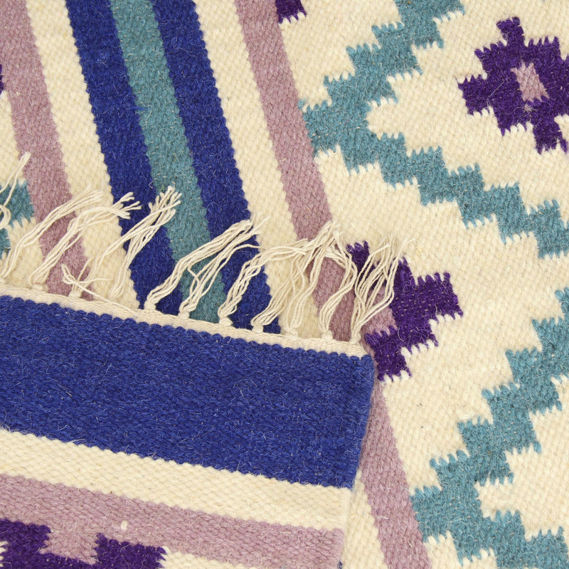 Tapis ivoire / bleu en laine fabriqué à la main Aecca Cool Grace