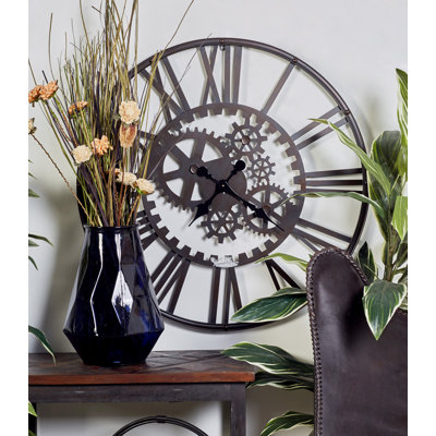 Horloge murale décorative en métal noir