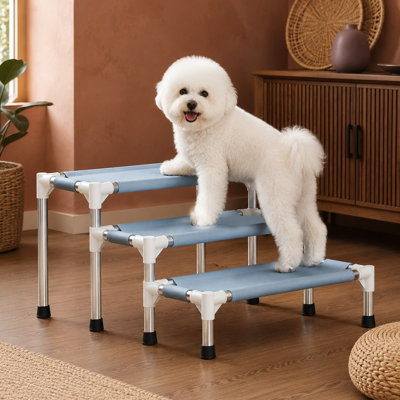 Escalier pour animaux de compagnie à 3 niveaux de 33 cm (13 pouces) avec marches en tissu de coton et fond antidérapant ; sa structure stable en acier inoxydable aide les petits animaux à atteindre les lits et canapés en hauteur et se monte facilement pour une utilisation quotidienne.