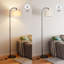 Lampe sur pied arquée à intensité variable de 63 po avec télécommande