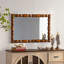 Miroir mural en bois sculpté