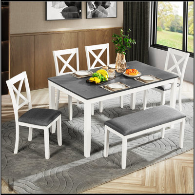 Ensemble de table de salle à manger moderne pour 6 personnes avec banc, spacieux et élégant pour les repas de famille et les rassemblements dans une finition bicolore