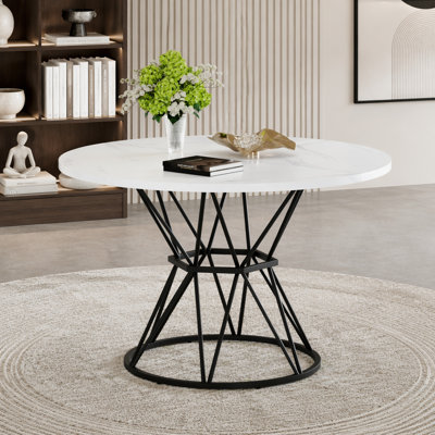 A circular dining table with a diameter of 47.3 inches, composed of 4 MDF boards,black hourglass shaped metal brackets,and a modern industrial style dining table for 4-6 people.