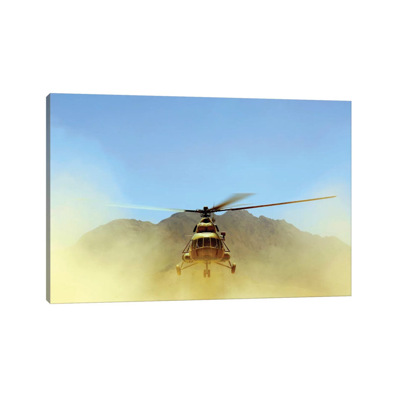 A Mi-17 Hip Helicopter Hovers Over A Firing Range In Afghanistan by Stocktrek Images - Wrapped Canvas Print