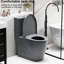 Toilette en céramique grise 001. Siège à double chasse 1,1 / 1,6. Eau, bol allongé. Hauteur pour la hauteur de la salle de bain,