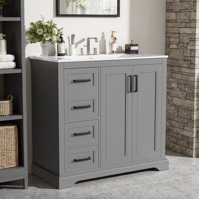 Meuble-lavabo moderne 36 po avec lavabo en céramique, 3 tiroirs et tablette réglable, portes à fermeture en douceur, poignées en alliage de zinc argenté, conception symétrique, robinet central de 4 po