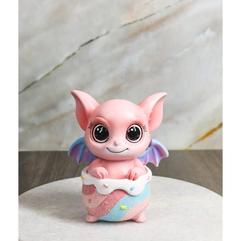 Figurine rose Paff Taffy Drake Potion petit bébé dragon assis dans un chaudron