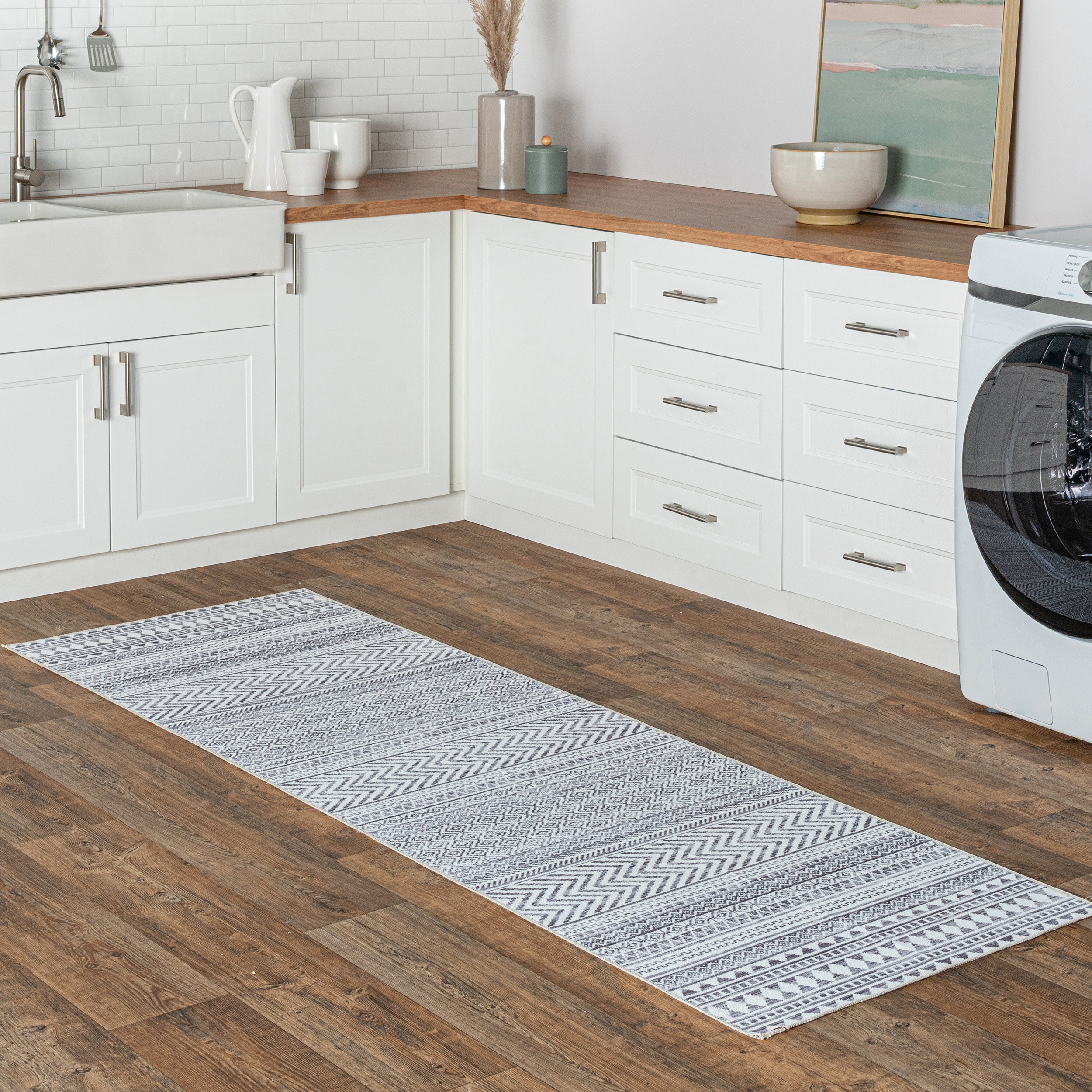 https://assets.wfcdn.com/im/62346443/compr-r85/1626/162630045/yvelines-southwestern-machine-washable-area-rug-in-gray.jpg