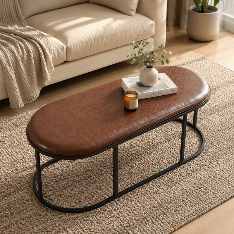 Table basse ovale en similicuir 55,12 po avec base en métal
