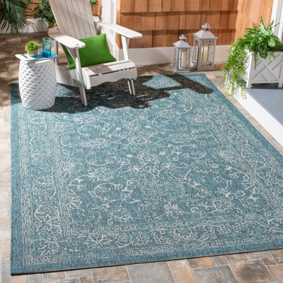 Tapis d'intérieur / extérieur à motif floral Cherene