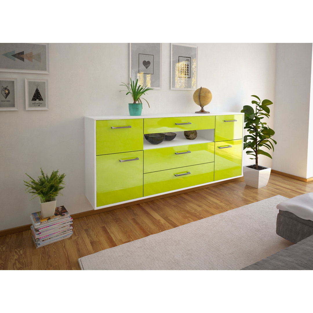 Das Sideboard Barri hat Metallgriffe und die Maße 180 cm x 79 cm x 35 cm.