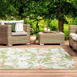 Tapis d'extérieur à motif de feuilles tropicales