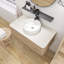 Meuble-lavabo mural en contreplaqué pré-assemblé avec plateau en pierre frittée, tiroir et lavabo rond en céramique, couleur grain de bois chêne blanc-780406607