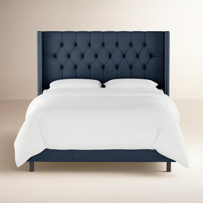 Breckin Upholstered Wingback Bed